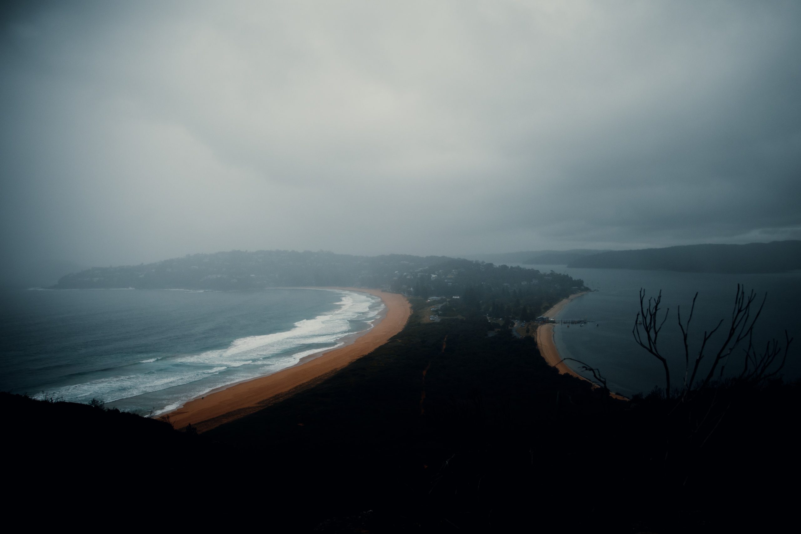 view from barrenjoey lighthouse at palm beach right before a storm