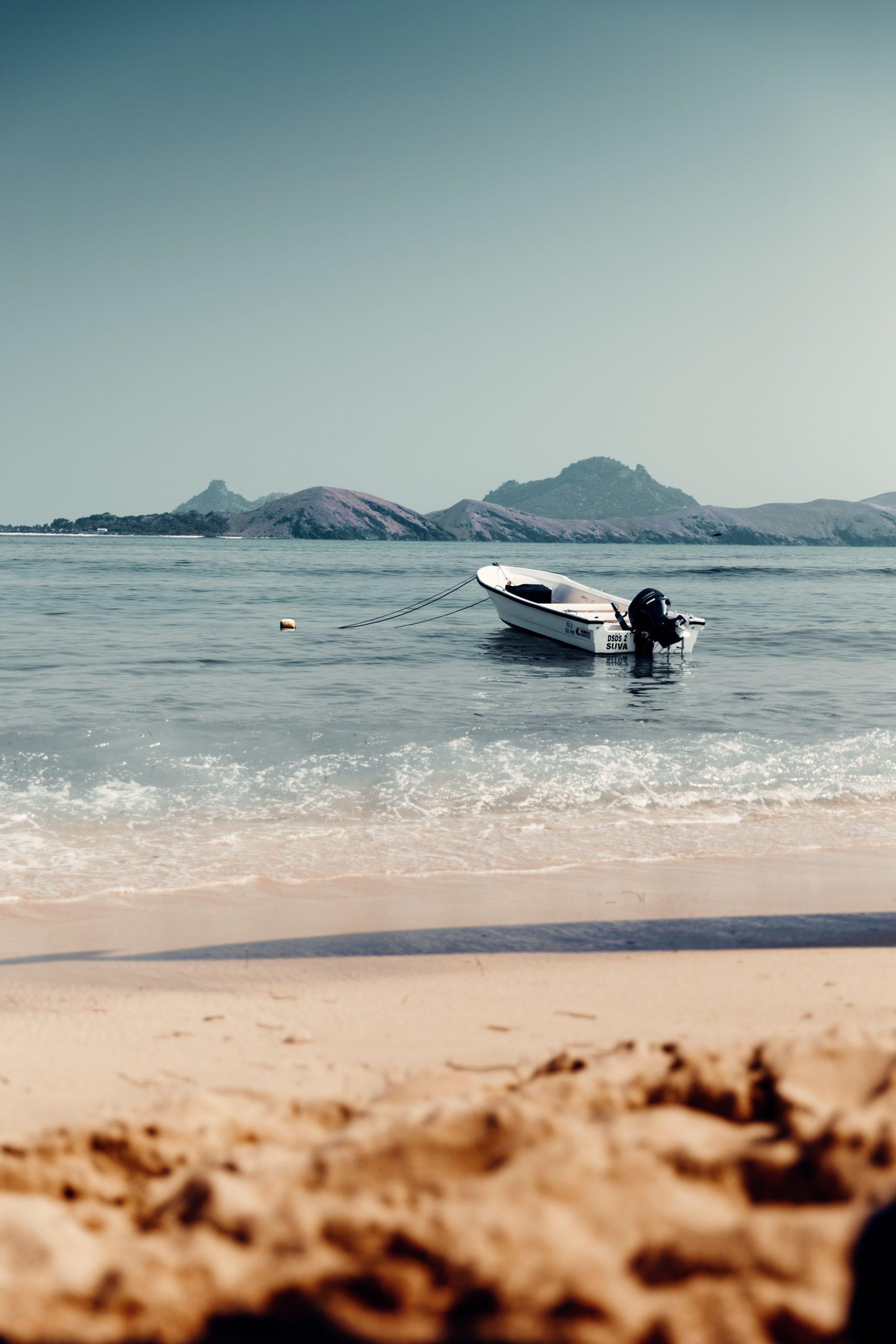 boat anchored to beach in Fiji islands